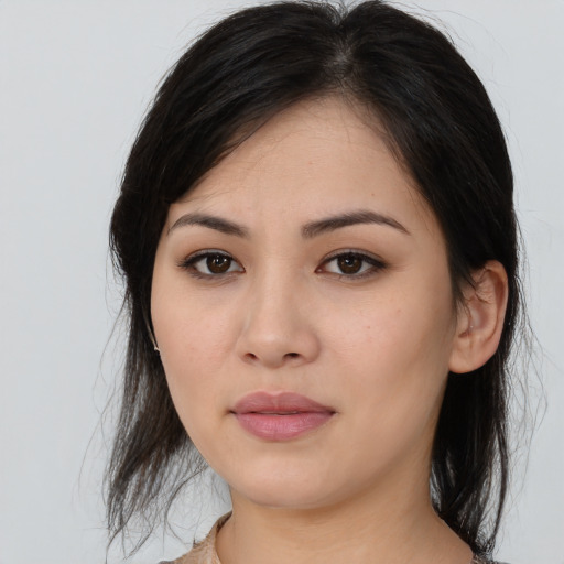Neutral asian young-adult female with medium  black hair and brown eyes