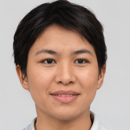 Joyful asian young-adult female with short  brown hair and brown eyes