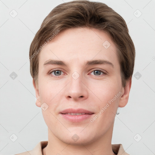 Joyful white young-adult female with short  brown hair and grey eyes