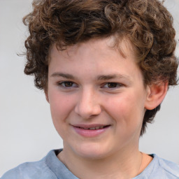 Joyful white child female with medium  brown hair and grey eyes