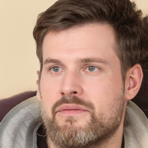 Neutral white adult male with short  brown hair and grey eyes