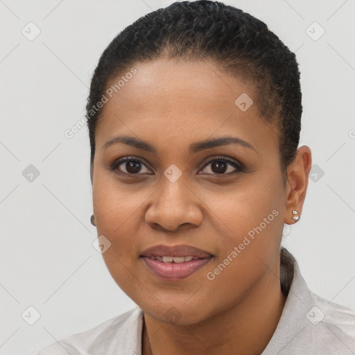 Joyful black young-adult female with short  brown hair and brown eyes