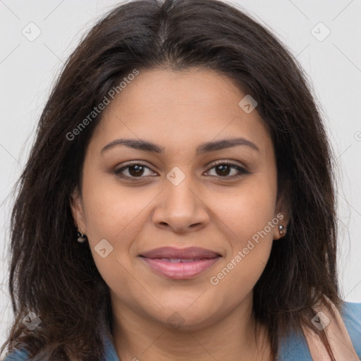 Joyful latino young-adult female with long  brown hair and brown eyes