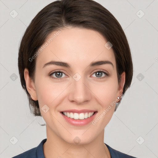 Joyful white young-adult female with medium  brown hair and grey eyes