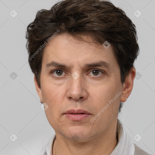 Neutral white adult male with short  brown hair and brown eyes