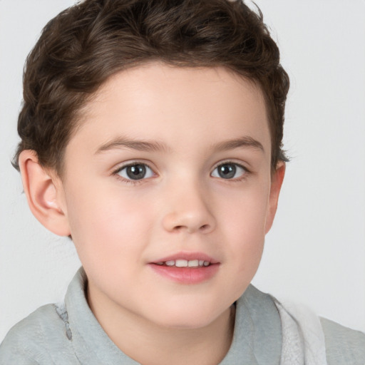 Joyful white child female with short  brown hair and brown eyes