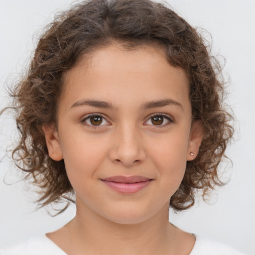 Joyful white child female with medium  brown hair and brown eyes