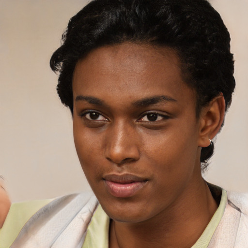 Neutral black young-adult female with short  black hair and brown eyes