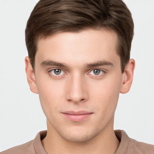 Neutral white young-adult male with short  brown hair and grey eyes