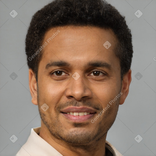 Joyful latino young-adult male with short  brown hair and brown eyes
