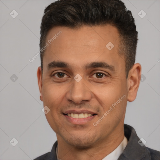 Joyful white adult male with short  brown hair and brown eyes