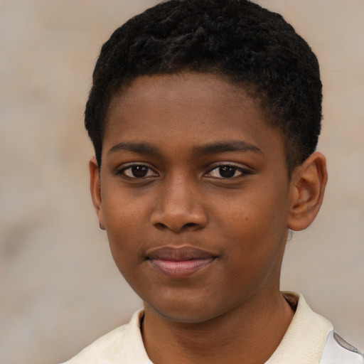 Joyful black child female with short  black hair and brown eyes