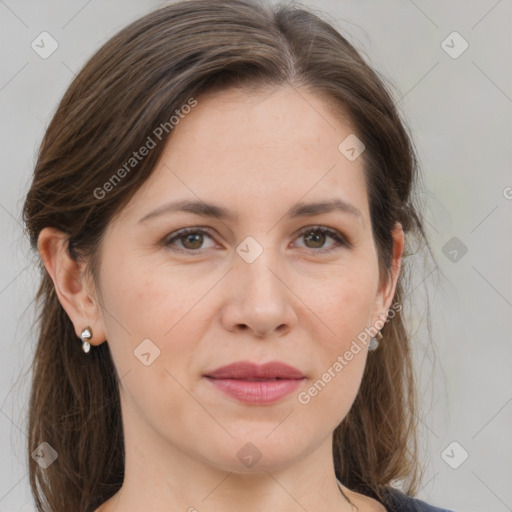 Joyful white adult female with medium  brown hair and grey eyes