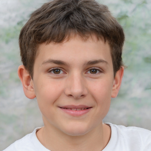 Joyful white child male with short  brown hair and brown eyes