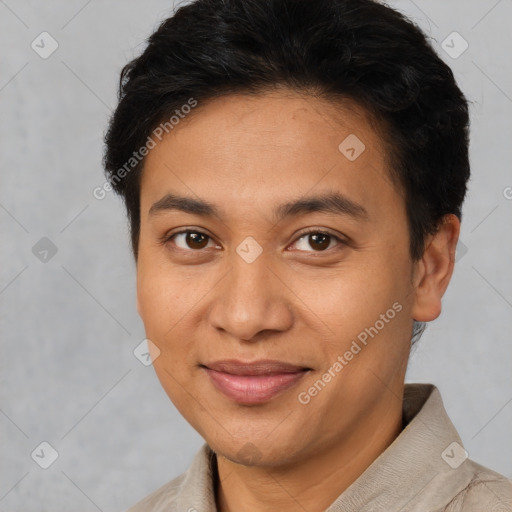 Joyful latino young-adult female with short  brown hair and brown eyes