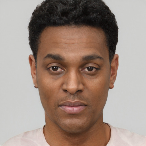 Neutral black young-adult male with short  black hair and brown eyes