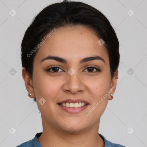 Joyful white young-adult female with short  brown hair and brown eyes