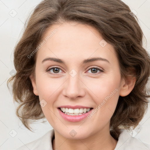 Joyful white young-adult female with medium  brown hair and green eyes