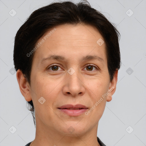 Joyful white adult female with short  brown hair and brown eyes