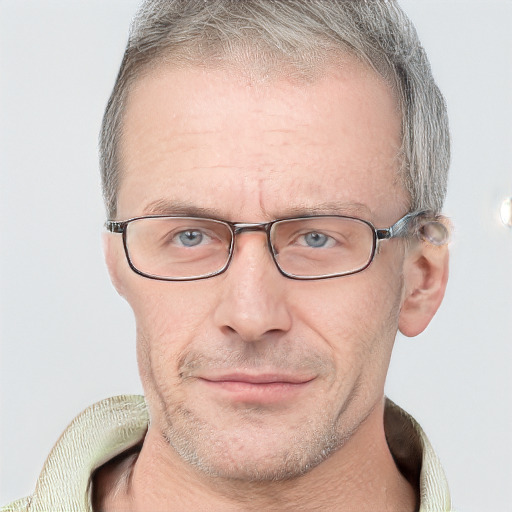 Neutral white middle-aged male with short  brown hair and blue eyes