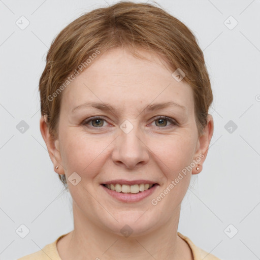 Joyful white young-adult female with short  brown hair and grey eyes