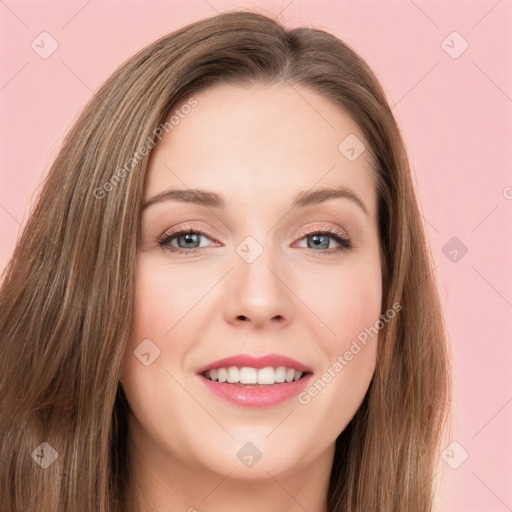 Joyful white young-adult female with long  brown hair and green eyes