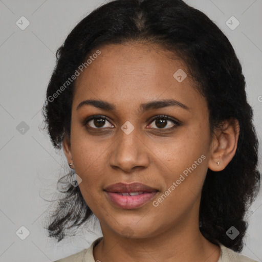 Joyful black young-adult female with medium  black hair and brown eyes