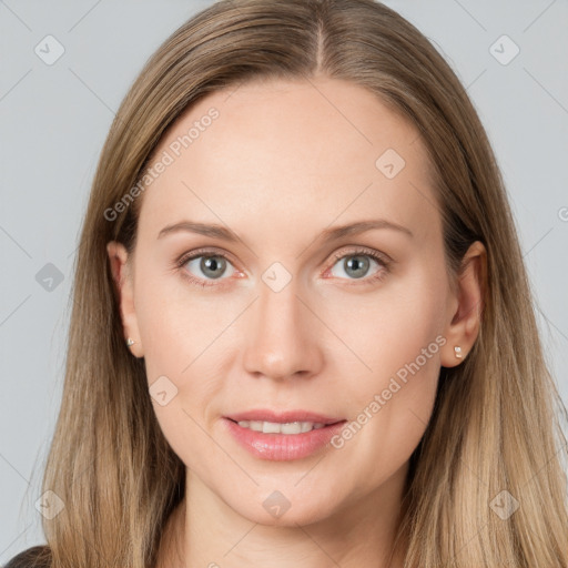 Joyful white young-adult female with long  brown hair and grey eyes