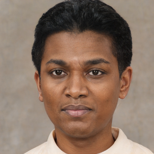 Neutral latino young-adult male with short  black hair and brown eyes