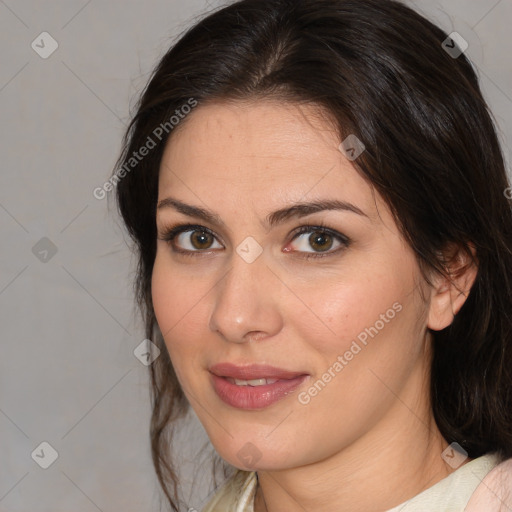 Joyful white adult female with medium  brown hair and brown eyes