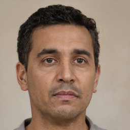 Neutral white adult male with short  black hair and brown eyes