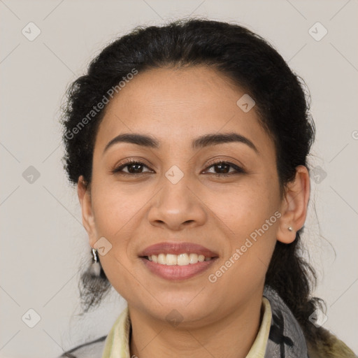 Joyful latino young-adult female with medium  brown hair and brown eyes