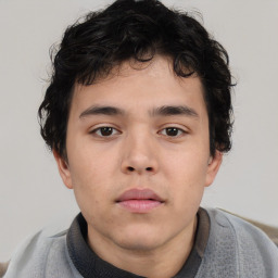 Neutral asian child male with short  brown hair and brown eyes