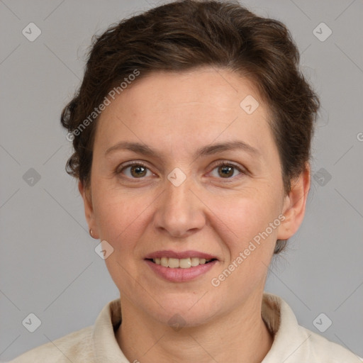 Joyful white adult female with short  brown hair and brown eyes