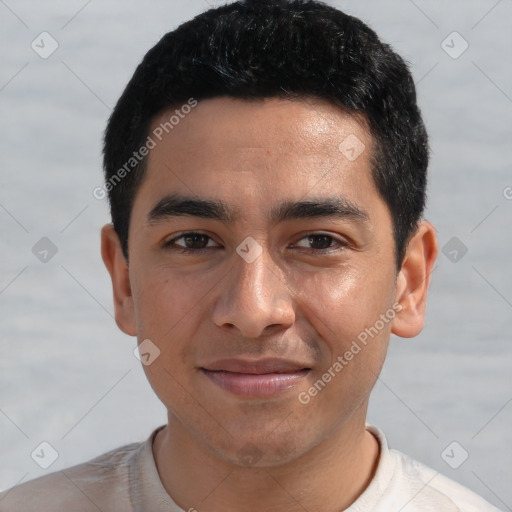 Joyful white young-adult male with short  black hair and brown eyes