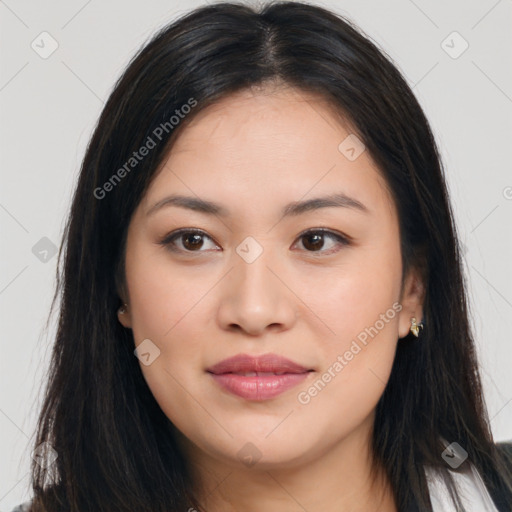 Joyful asian young-adult female with long  brown hair and brown eyes