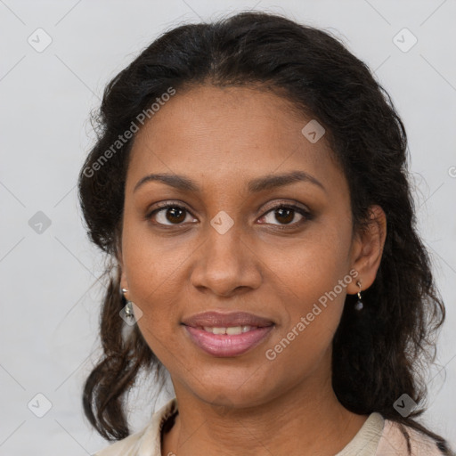 Joyful black young-adult female with medium  brown hair and brown eyes