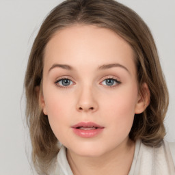 Neutral white young-adult female with medium  brown hair and grey eyes