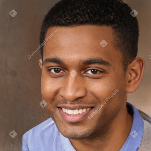 Joyful black young-adult male with short  brown hair and brown eyes