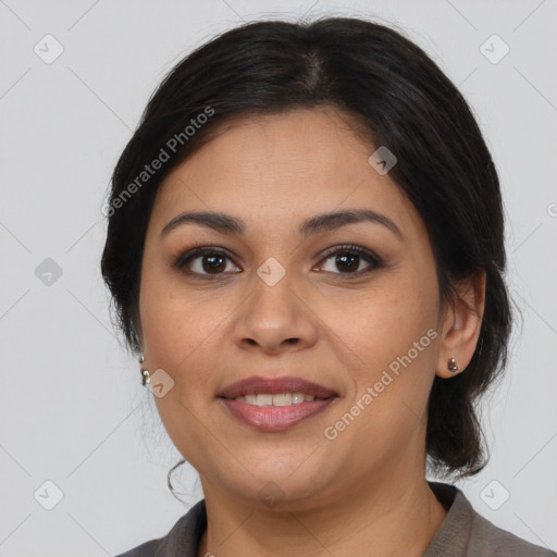 Joyful latino young-adult female with medium  brown hair and brown eyes