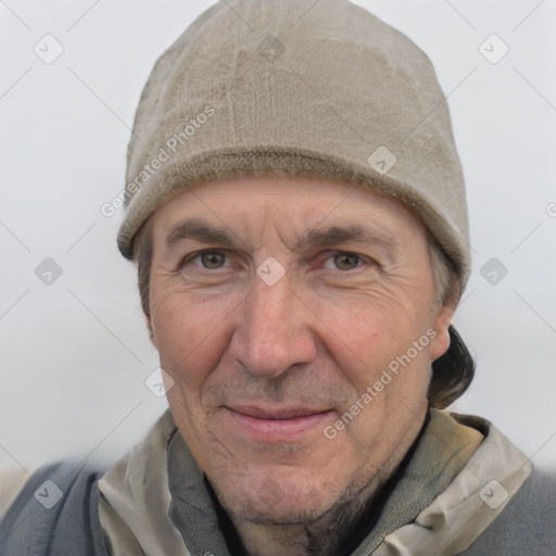 Joyful white adult male with short  brown hair and grey eyes