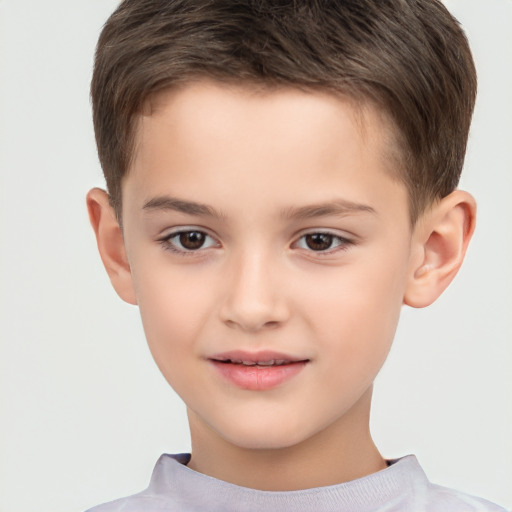 Joyful white child male with short  brown hair and brown eyes