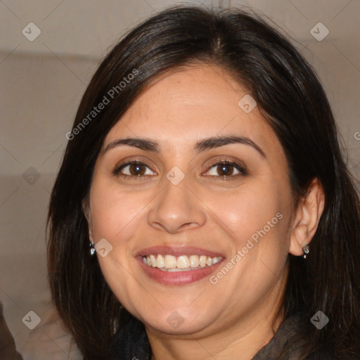 Joyful white adult female with medium  brown hair and brown eyes