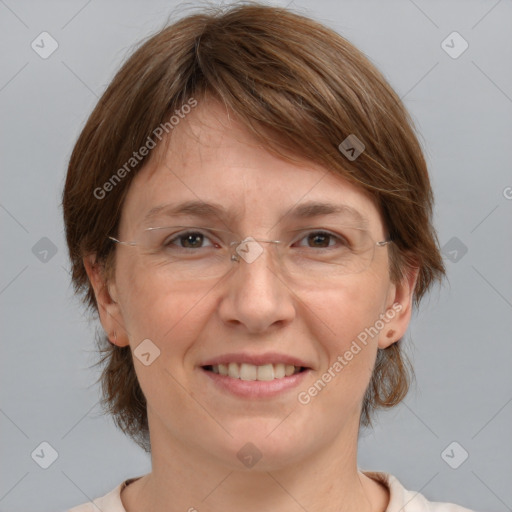 Joyful white adult female with medium  brown hair and grey eyes