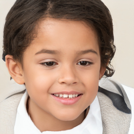 Joyful white child female with short  brown hair and brown eyes