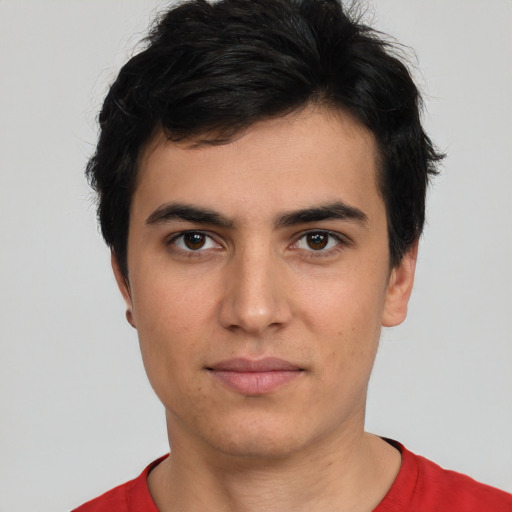 Neutral white young-adult male with short  black hair and brown eyes