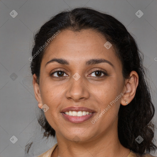 Joyful latino young-adult female with long  brown hair and brown eyes