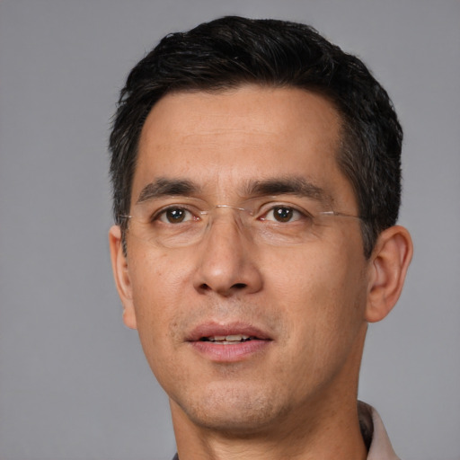Neutral white adult male with short  black hair and brown eyes