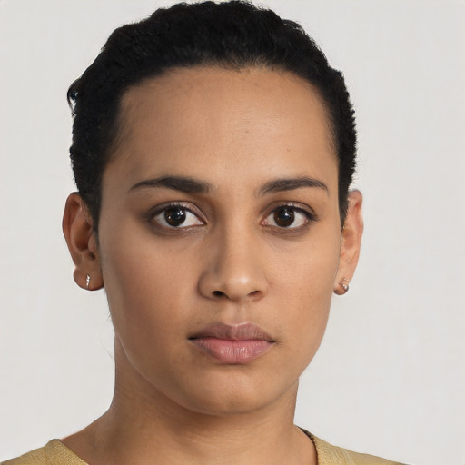 Neutral latino young-adult female with short  black hair and brown eyes