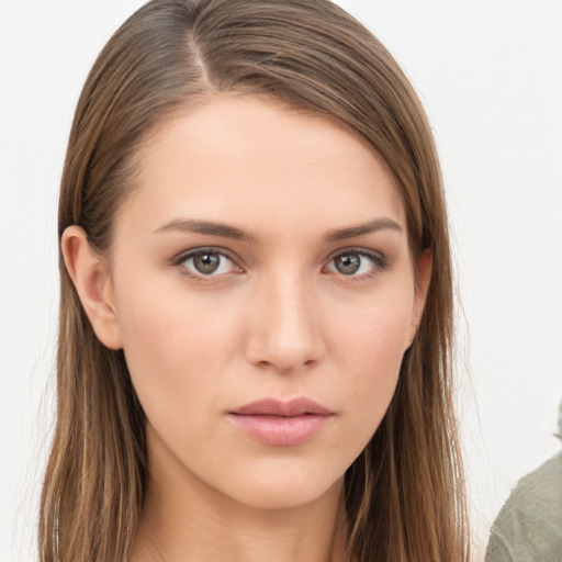 Neutral white young-adult female with long  brown hair and brown eyes